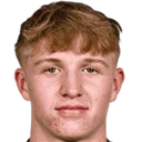 Том Етчесон