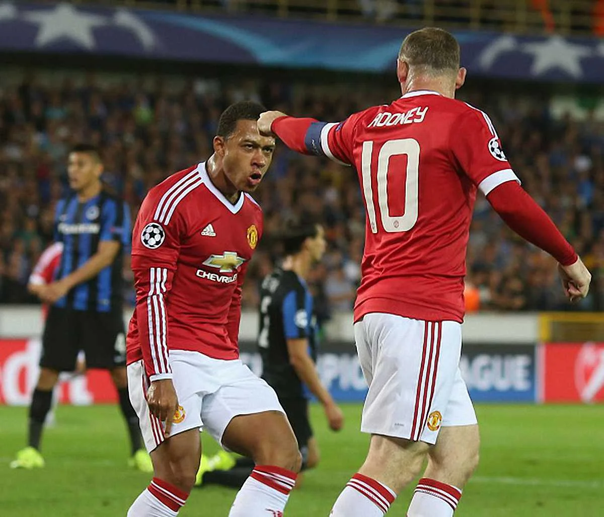 Депай респектує Руні за хет-трик / Getty Images