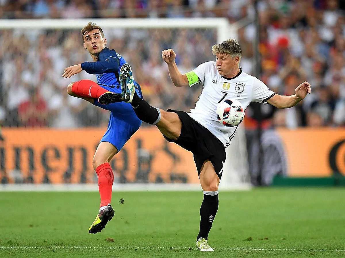 Гризманн и Швайнштайгер / Getty Images