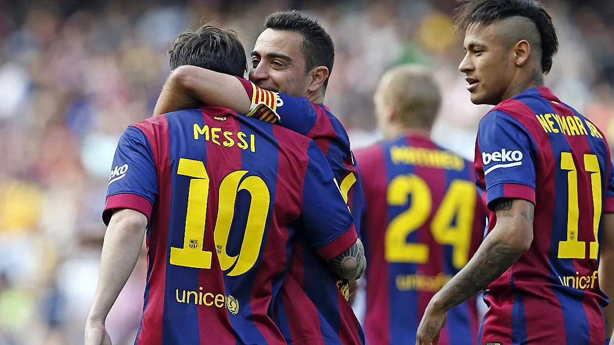 Месси та Хави / Getty Images