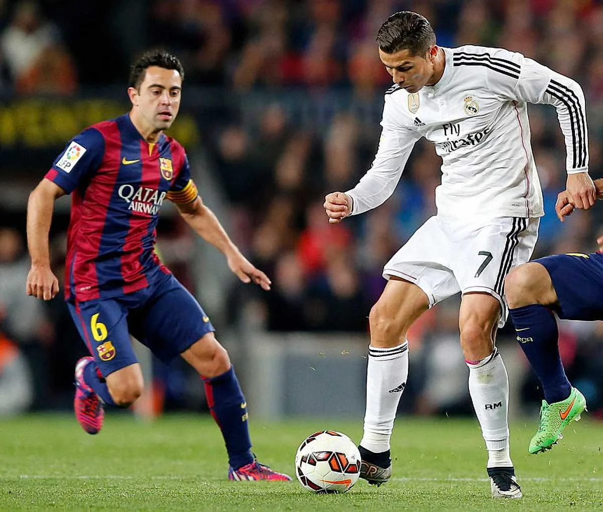 Хаві та Роналду / Getty Images