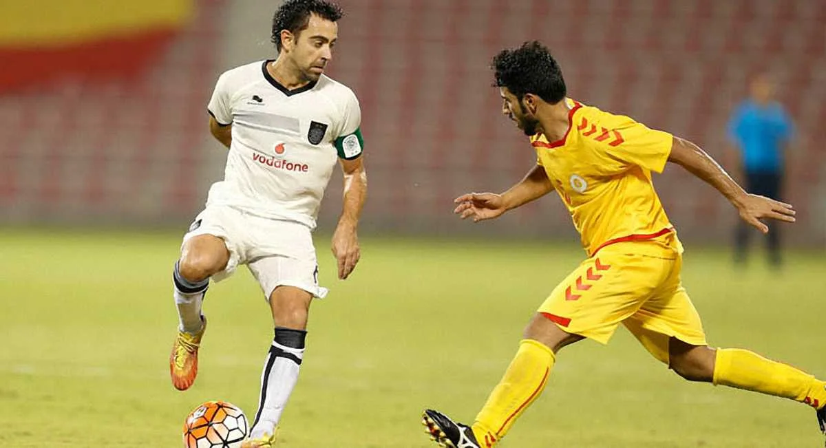 Хави (слева)