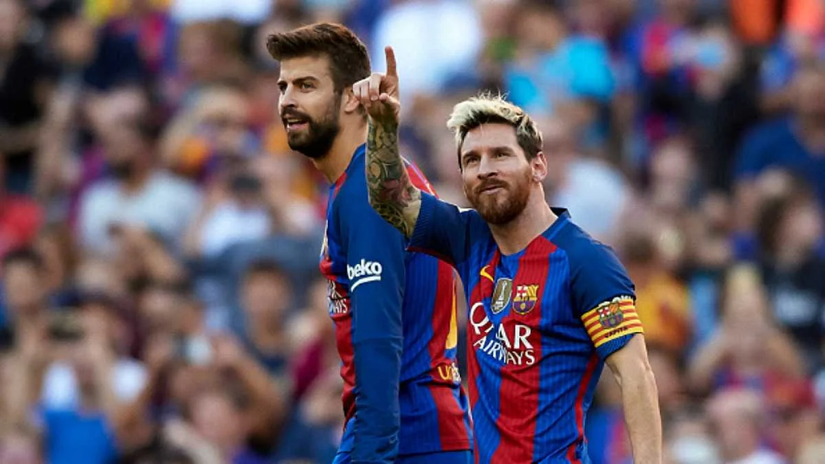 Жерар Пике и Лионель Месси / Getty Images