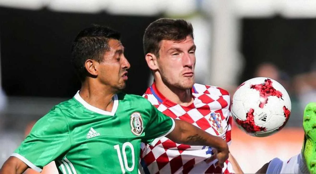 Борна Барішіч (справа) зіграв 3 матчі за національну збірну Хорватії