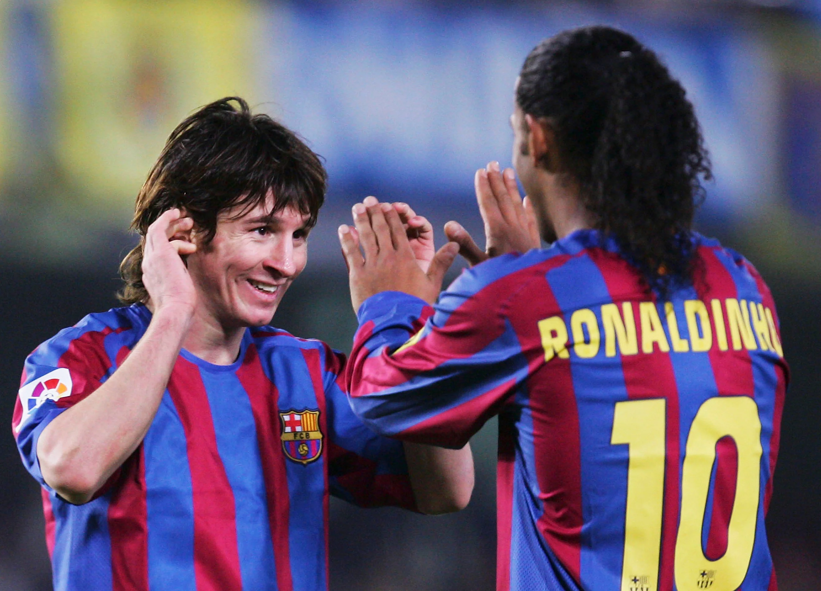 Мессі та Роналдінью у Барселоні / Getty Images