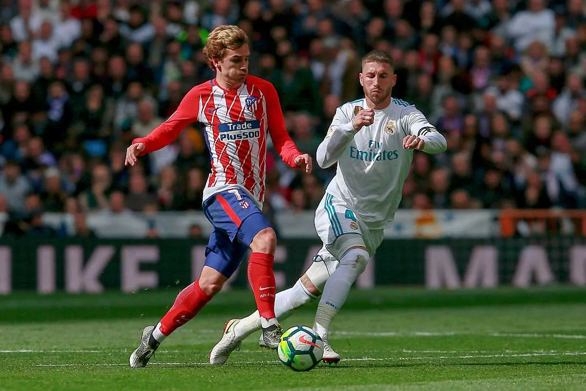 Антуан Грізманн та Серхіо Рамос / Getty Images