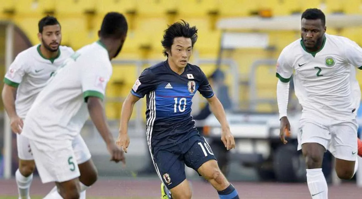 Шоя Накадзима (в центре) / Kyodo