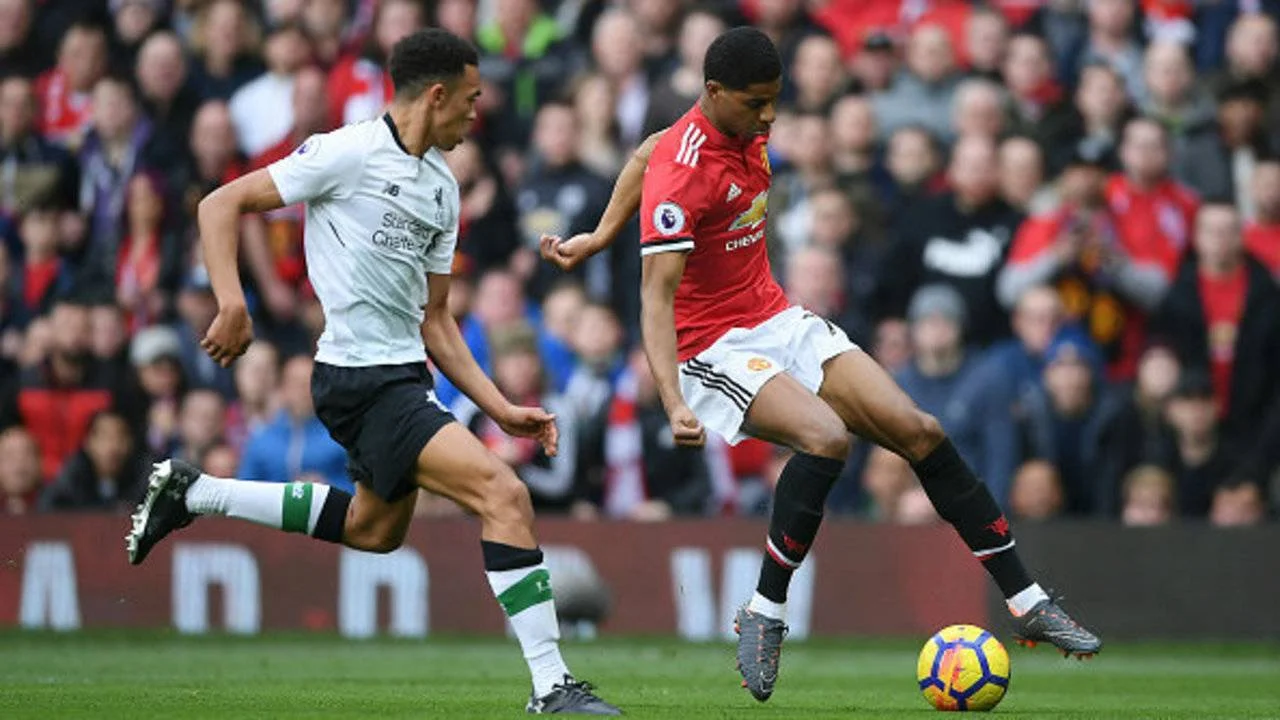 Трент Александер-Арнольд и Маркус Решфорд / Getty Images