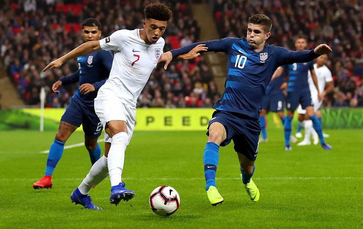 Джейдон Санчо та Крістіан Пулішіч