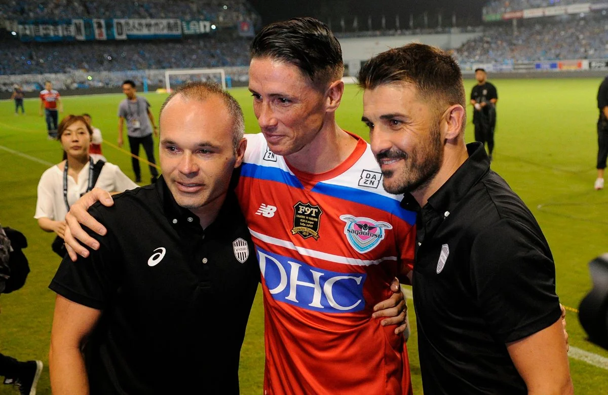 Фернандо Торрес с Андресом Иньестой и Давидом Вильей / Reuters