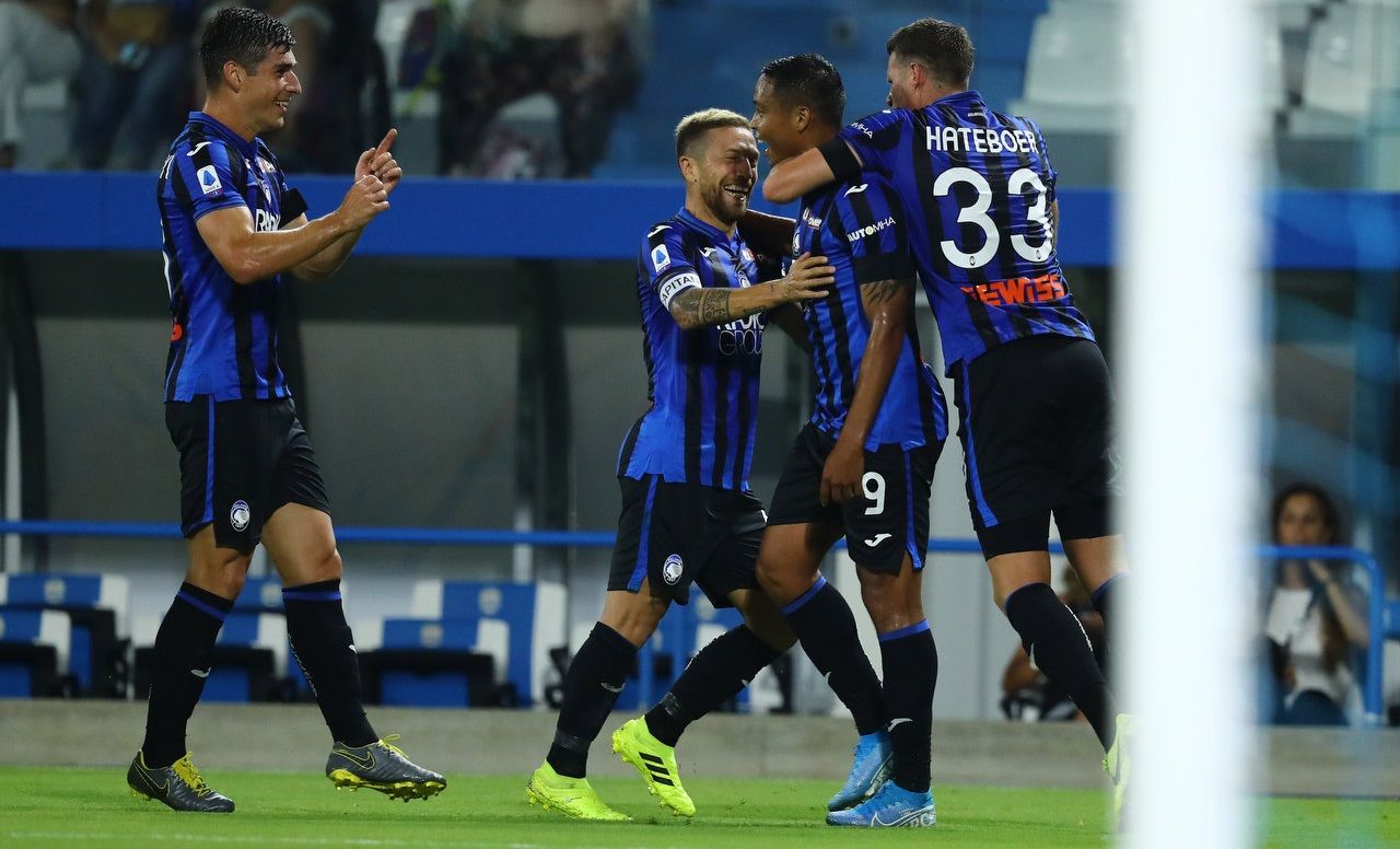 Руслан Малиновский (слева) с партнерами / Аталанта