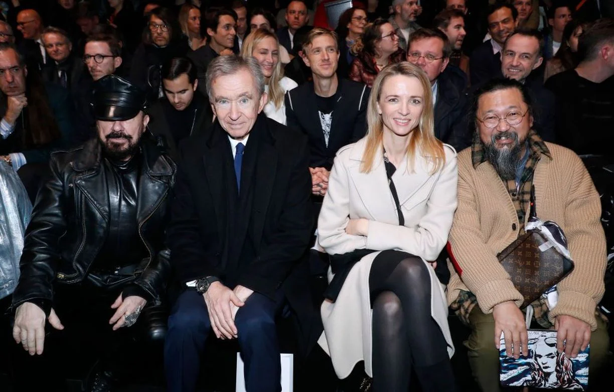 Бернар Арно (второй слева) готов приобрести Милан на своих условиях