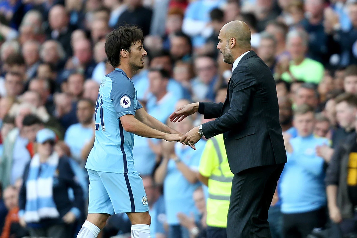 Давид Силва и Гвардиола / Getty Images