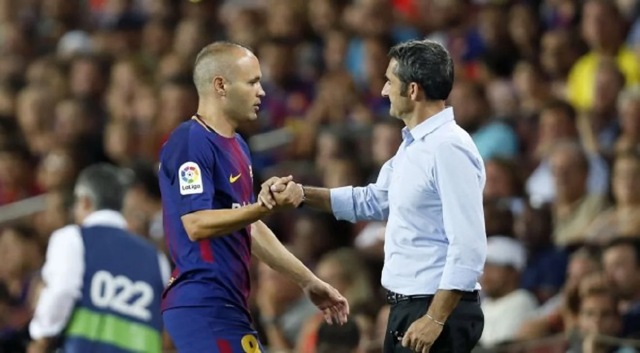 Иньеста и Вальверде / AFP