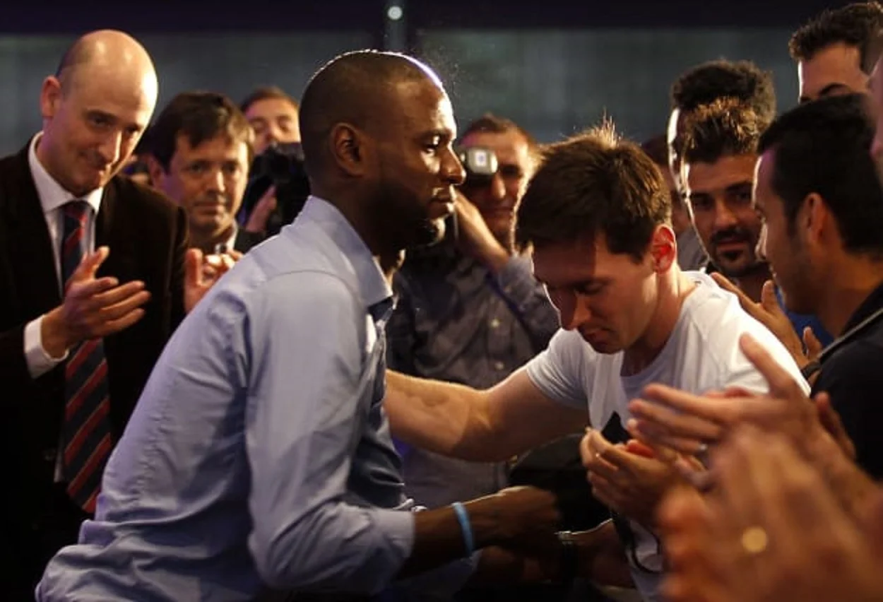 Эрик Абидаль и Лионель Месси / Фото FIFA