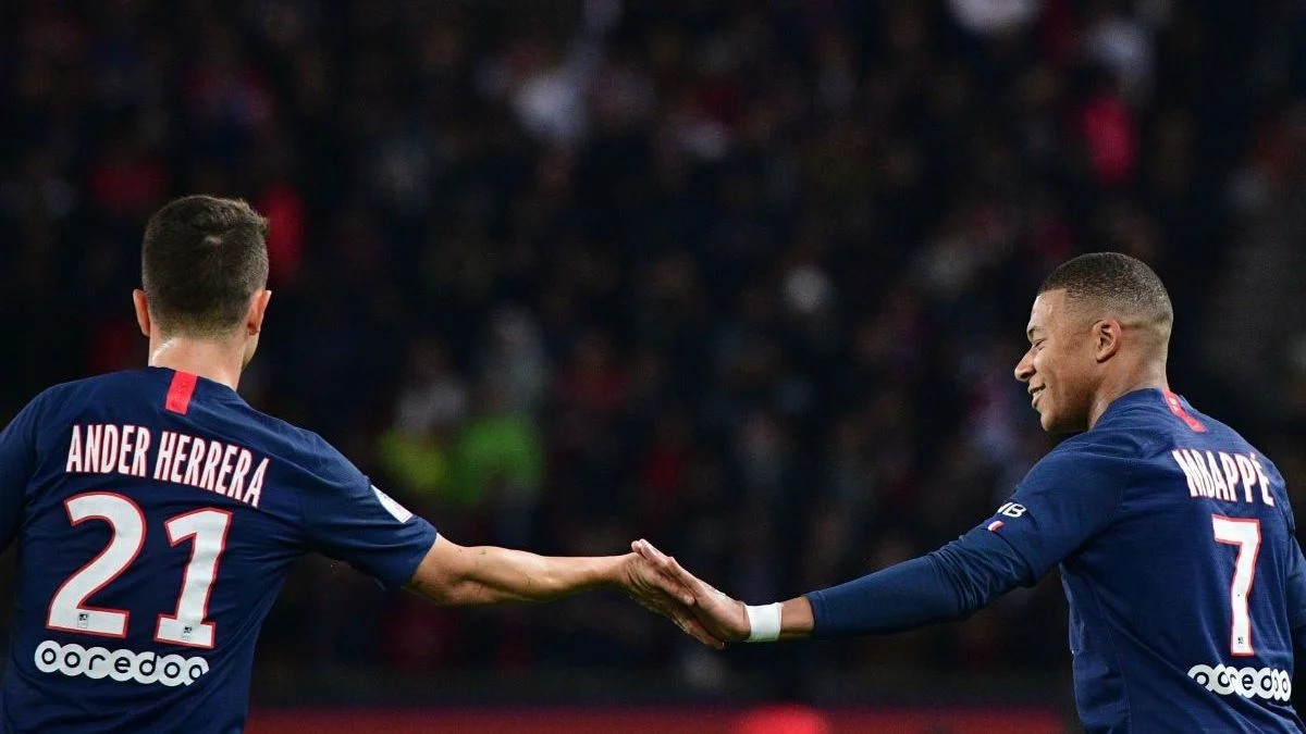 Эррера и Мбаппе / AFP