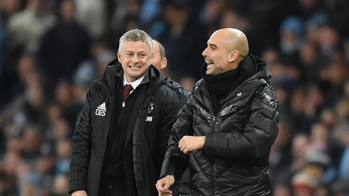 Уле Гуннар Сульшер и Хосеп Гвардиола / Getty Images