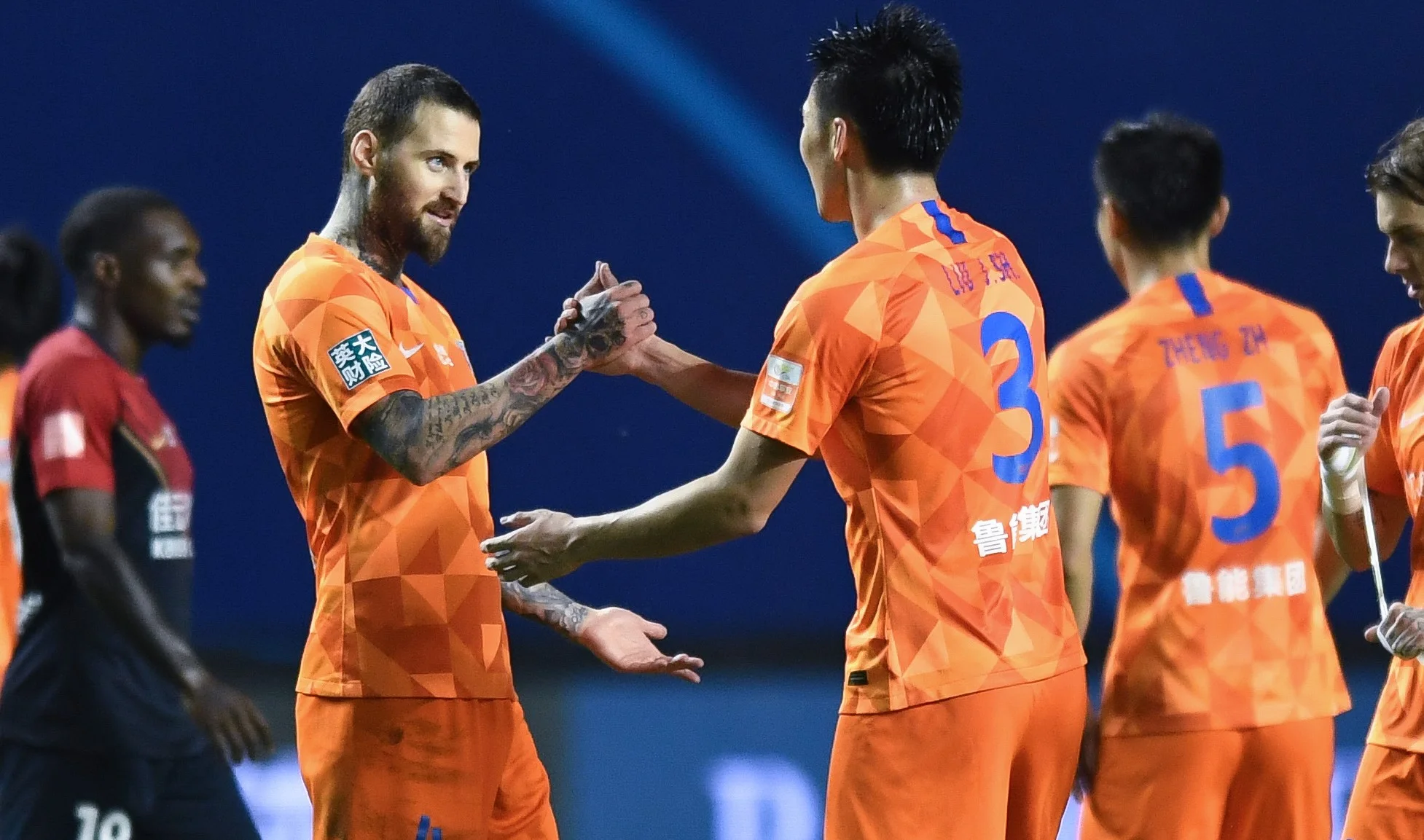 Тамаш Кадар (слева) / AFP