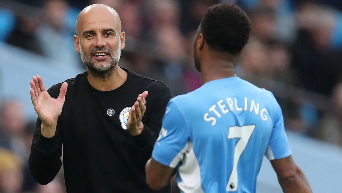 Гвардиола и Стерлинг / Getty images