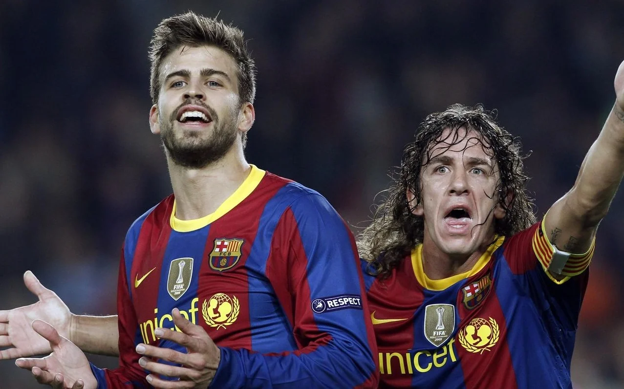 Пике и Пуйоль / Reuters