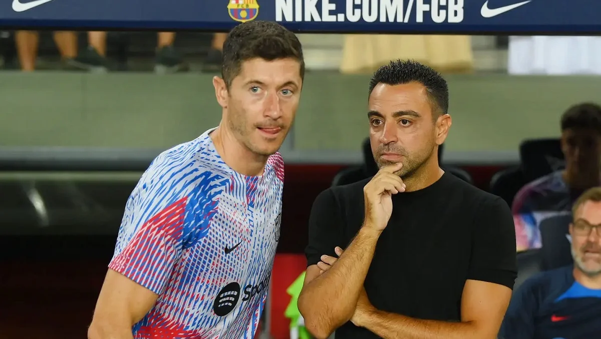 Левандовски и Хави / Getty images