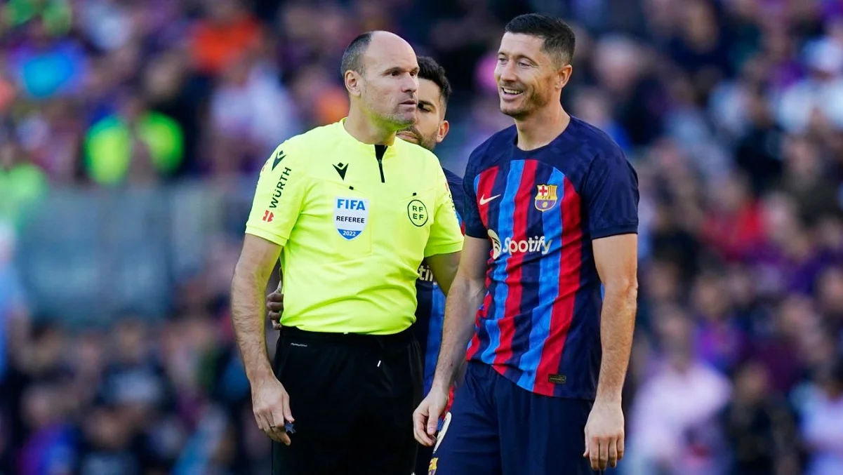 Матеу Лаос та Роберт Лєвандовскі / Getty images