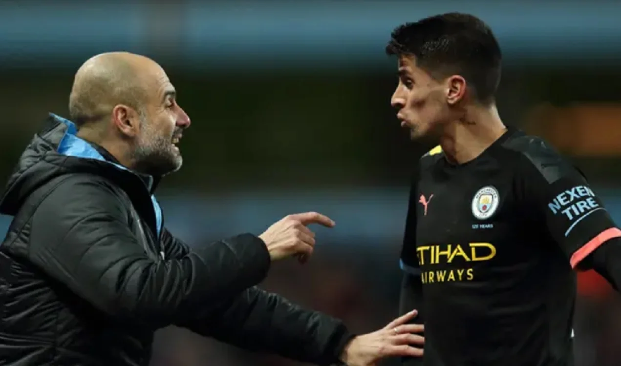 Гвардіола і Канселу / Getty Images