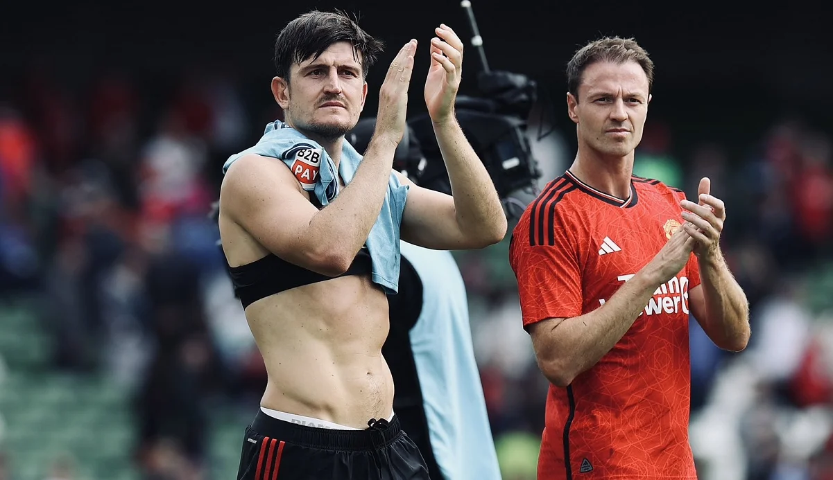 Харрі Магуайр з партнером/ фото: ФК Манчестер Юнайтед