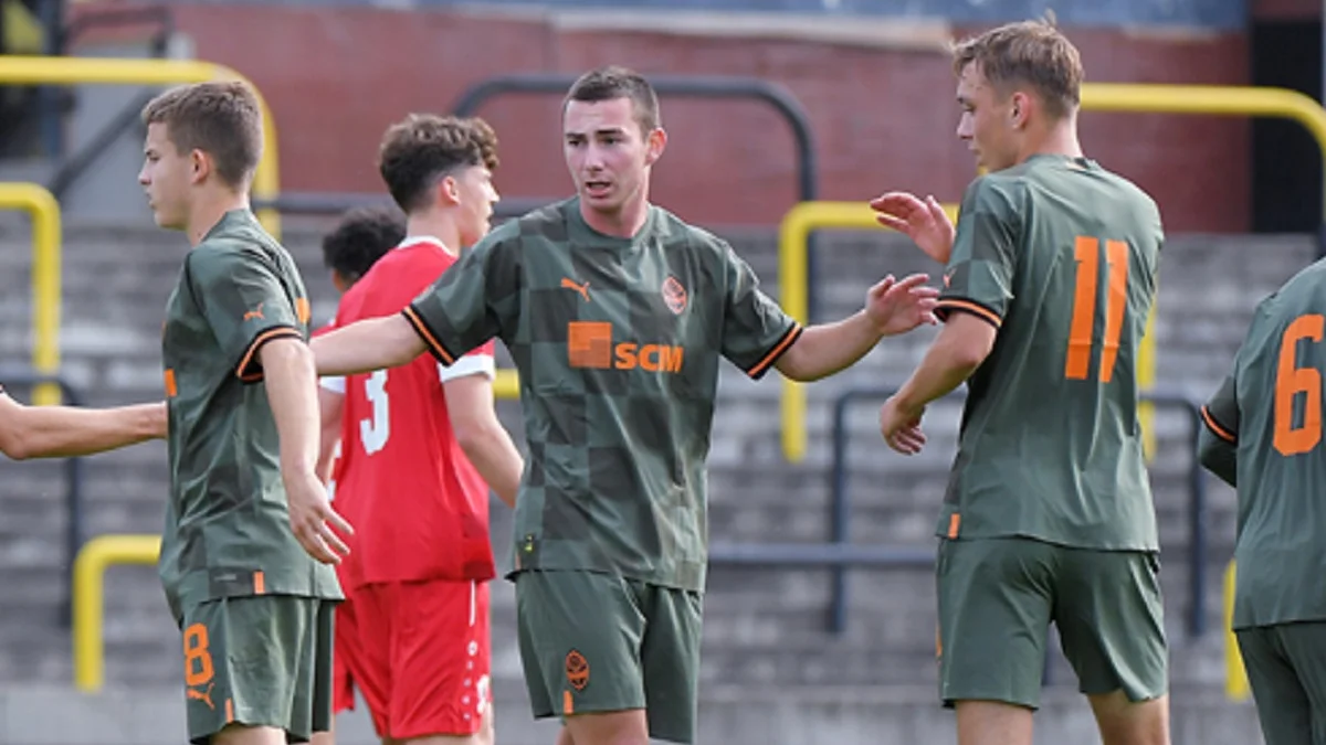 Олександр Роспутько (посередині) / фото: Шахтар