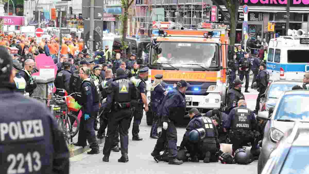 Полиция Гамбурга выстрелила в провокатора с коктейлем Молотова посреди марша фанов на Евро-2024