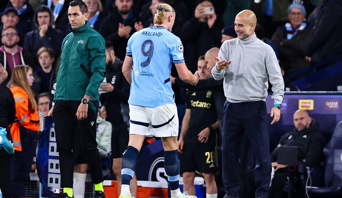 Эрлинг Холанд и Пеп Гвардиола / фото: Robbie Jay Barratt - AMA/Getty Images