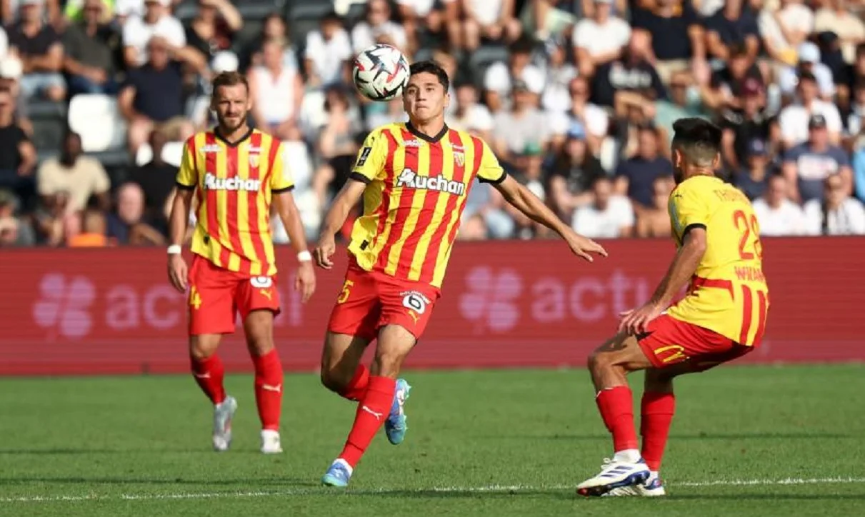 Абдукодир Хусанов (в центре) / A. Martin/L'Équipe