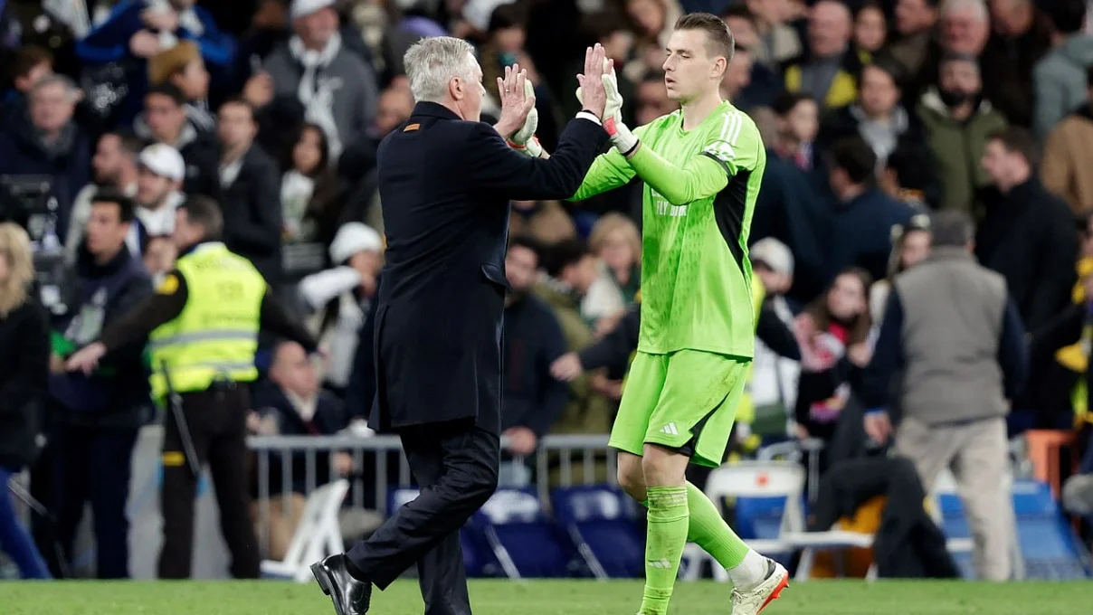 Анчелотти и Лунин / Getty Images