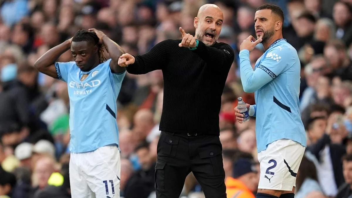 Жеремі Доку, Пеп Гвардіола та Кайл Вокер / фото: Martin Rickett/PA Images via Getty Images