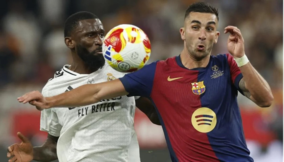 Антонио Рюдигер и Ферран Торрес / фото: EFE / Julio Muñoz.