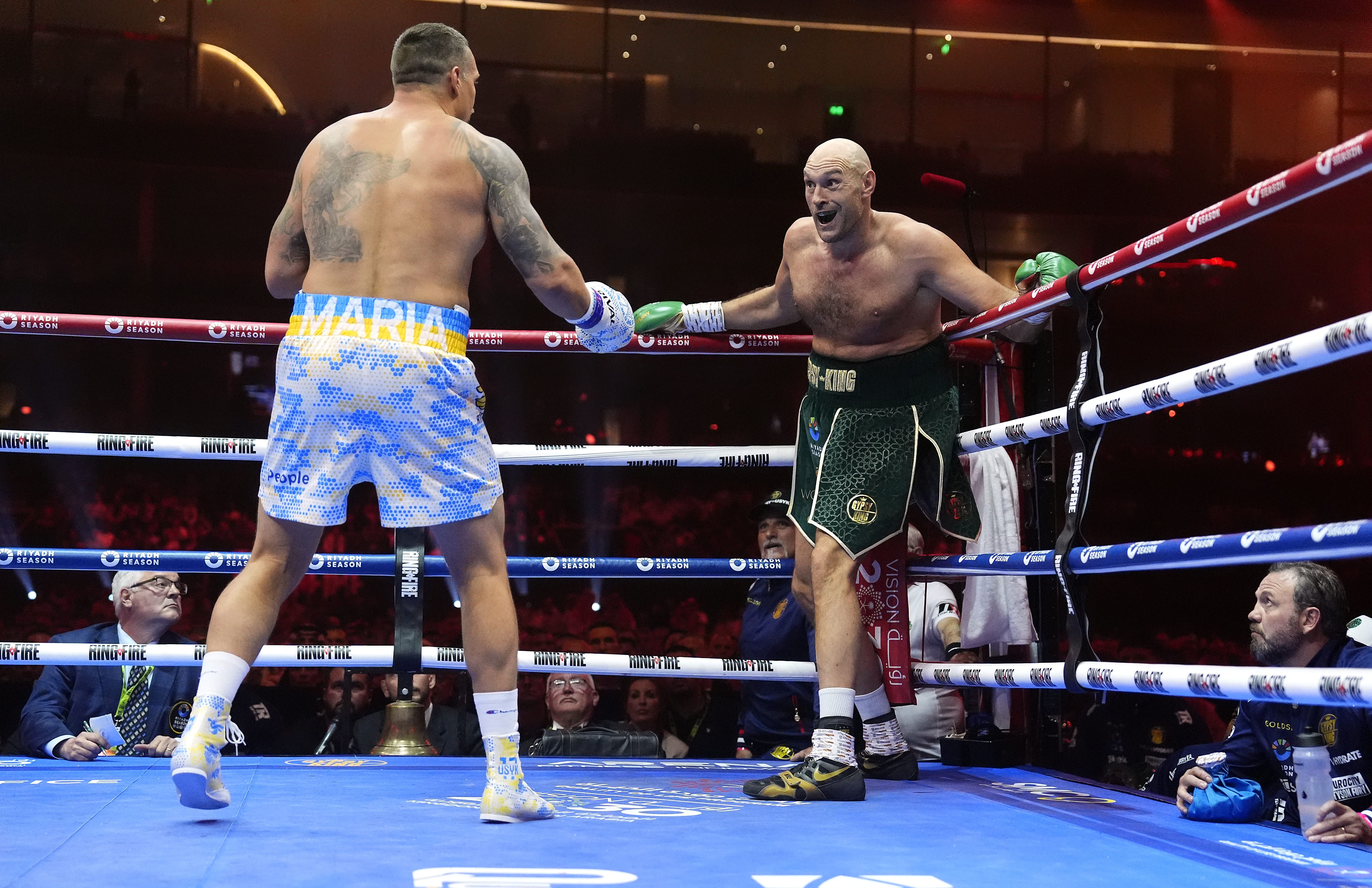 Олександр Усик та Тайсон Ф'юрі / Getty Images