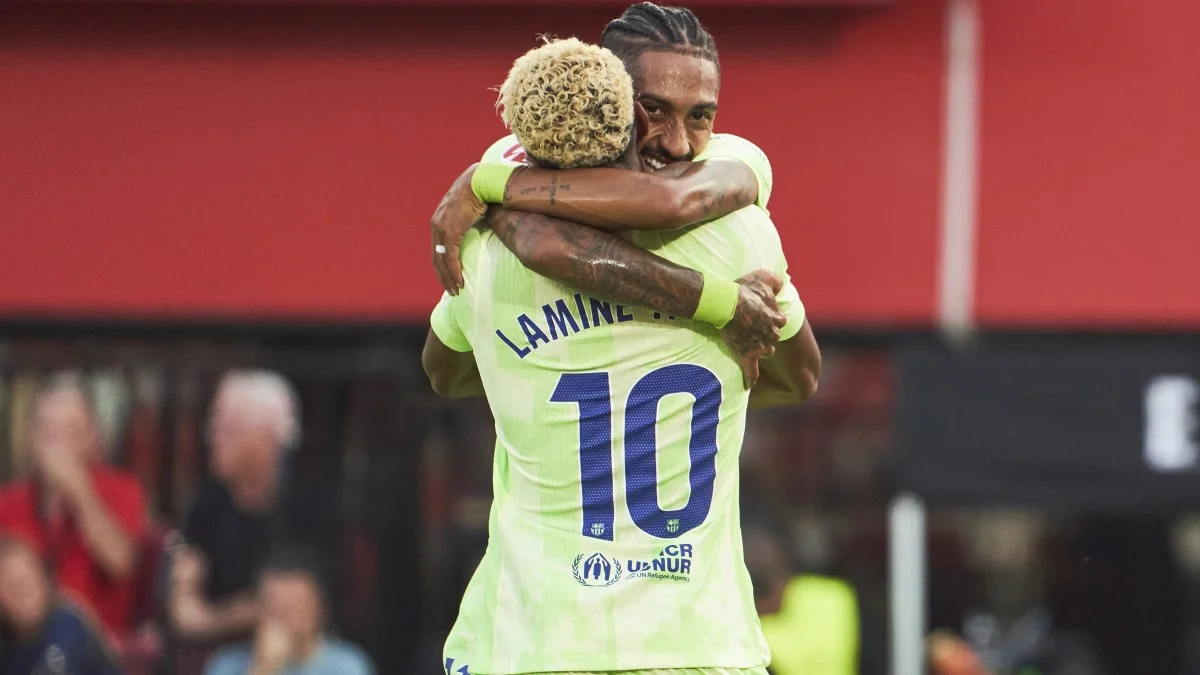 Рафинья и Ламин Ямаль / Getty Images