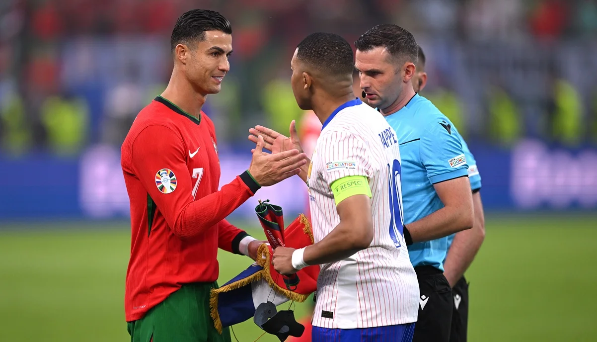 Криштиану Роналду и Килиан Мбаппе / фото: Stu Forster/Getty Images