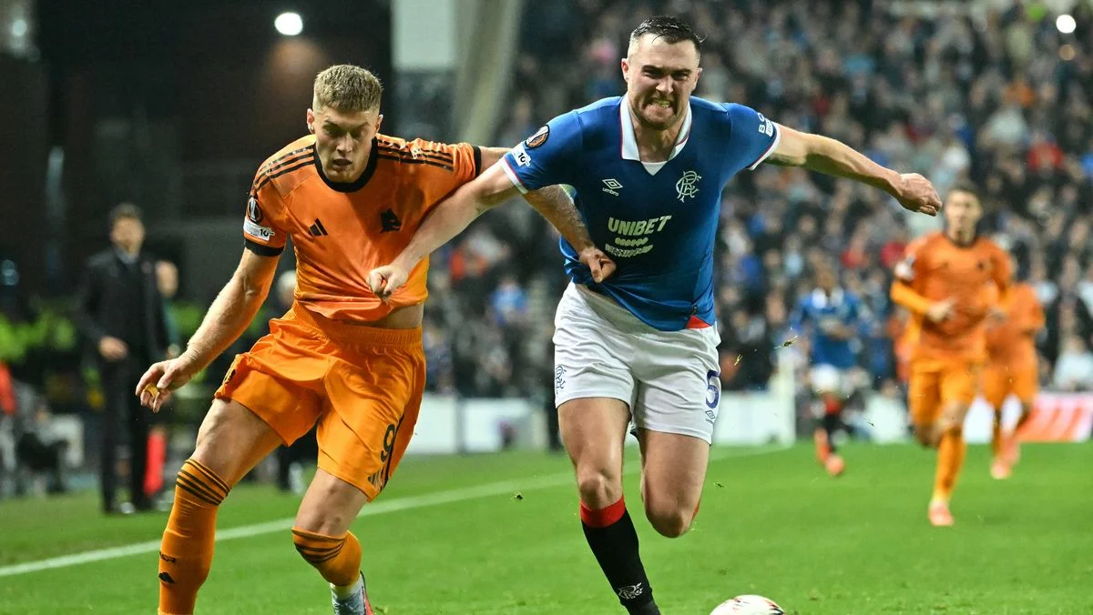 Артем Довбик и Джон Суттер / Photo by ANDY BUCHANAN/AFP via Getty Images