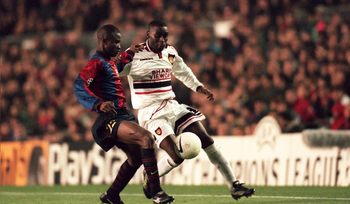 Самуель Окуново (ліворуч) проти Енді Коула / Getty Images