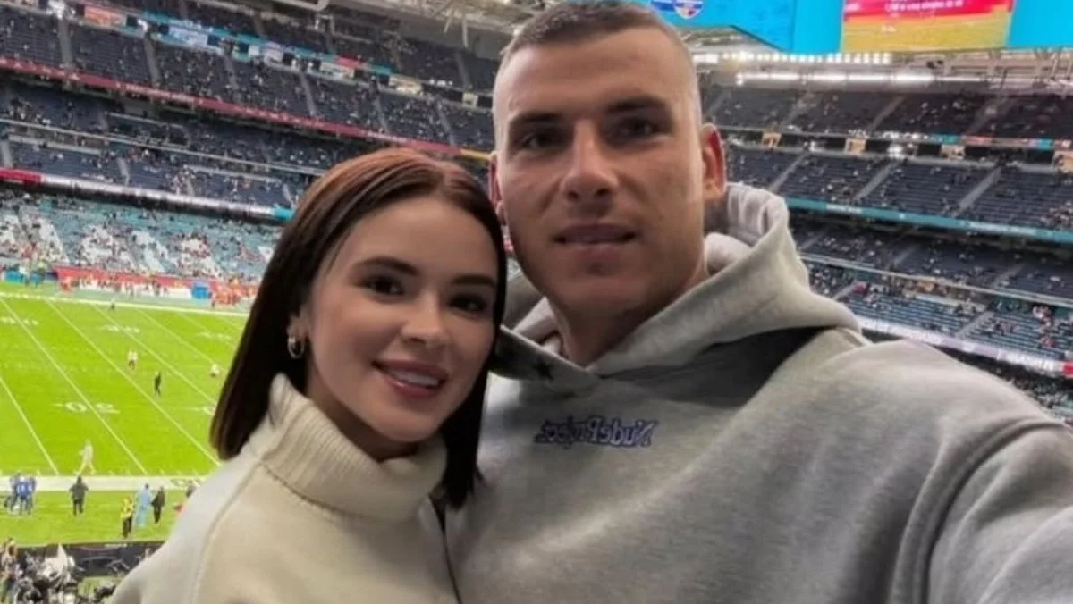 Андрій Лунін з дружиною на матчі НФЛ  