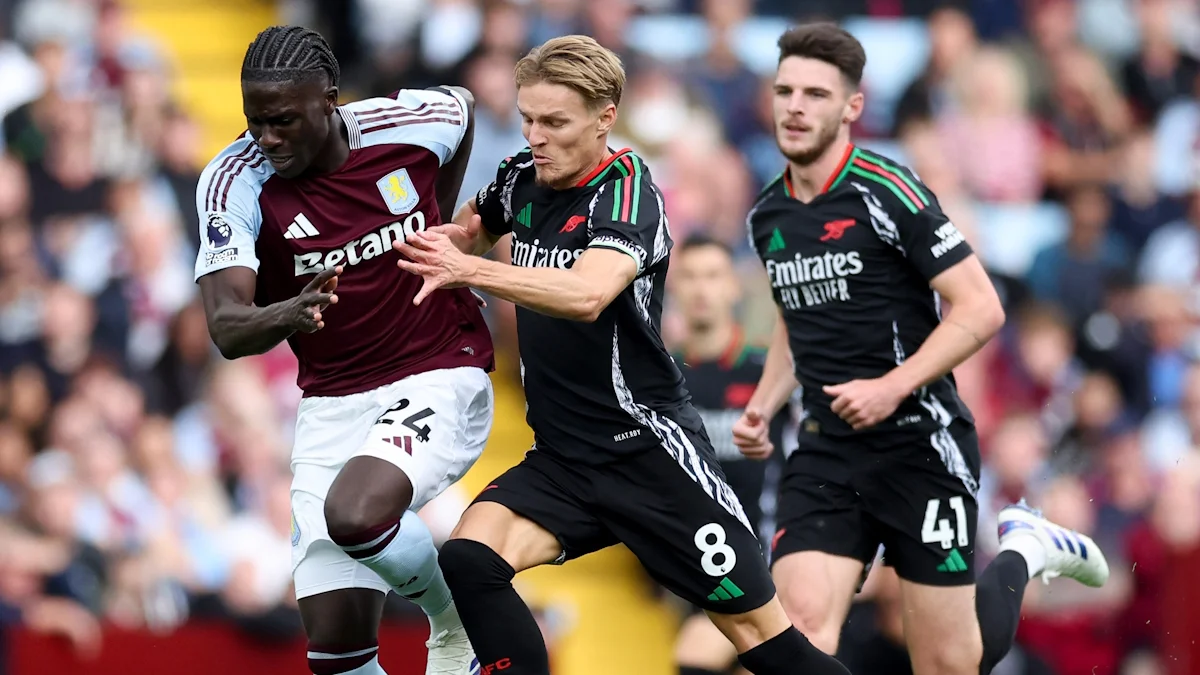 Амаду Онана проти Мартіна Едегора і Деклана Райса / Getty Images