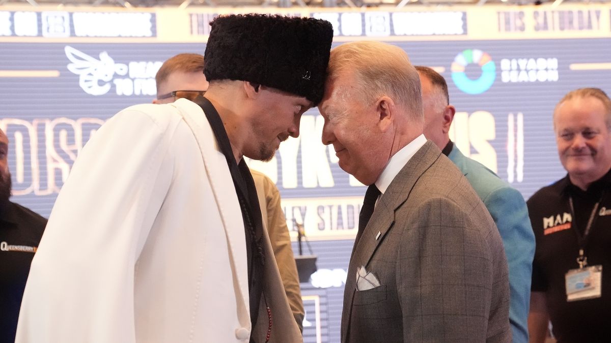 Александр Усик и Фрэнк Уоррен / Getty Images