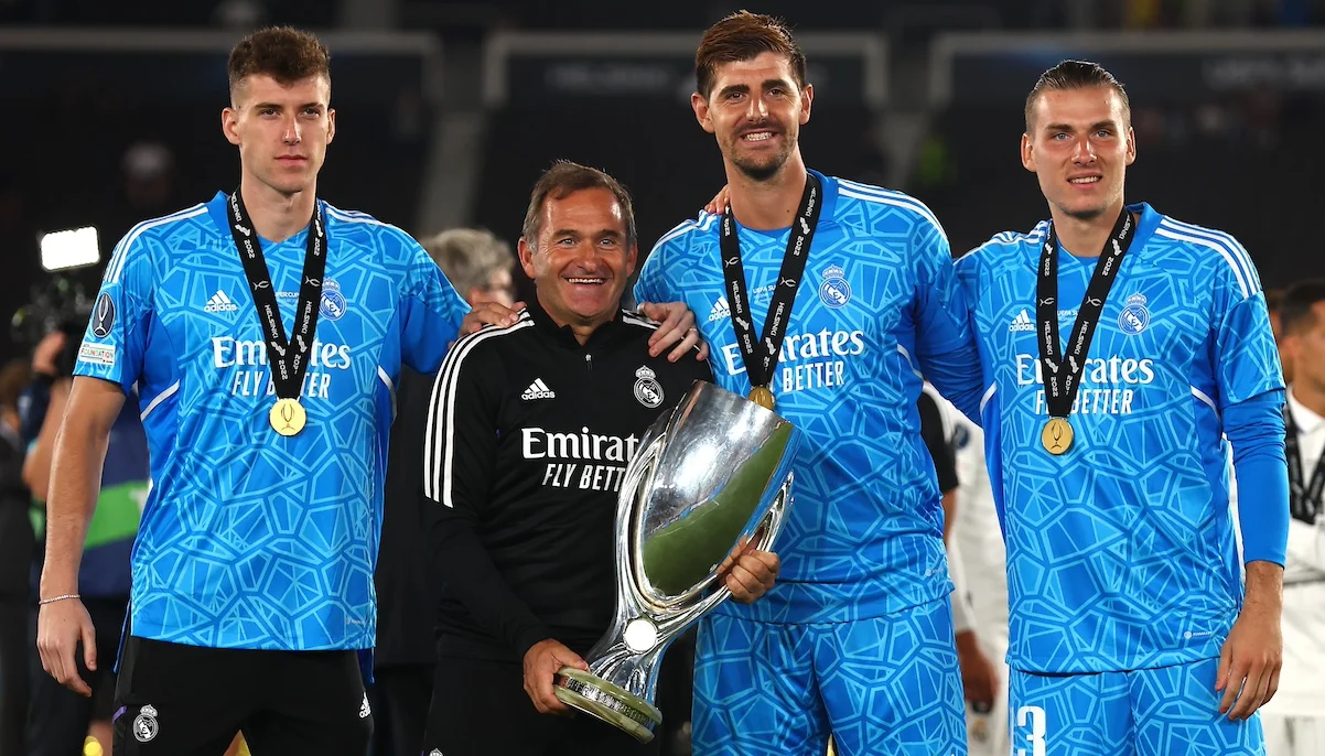 Тіто Куртуа, Андрій Лунін з партнером та тренером / фото: Chris Brunskill/Fantasista/Getty Images