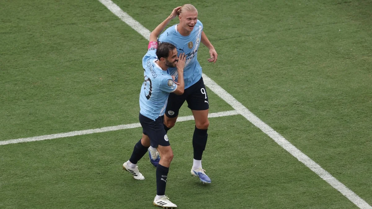 Бернарду Силва и Эрлинг Холанд / Getty Images