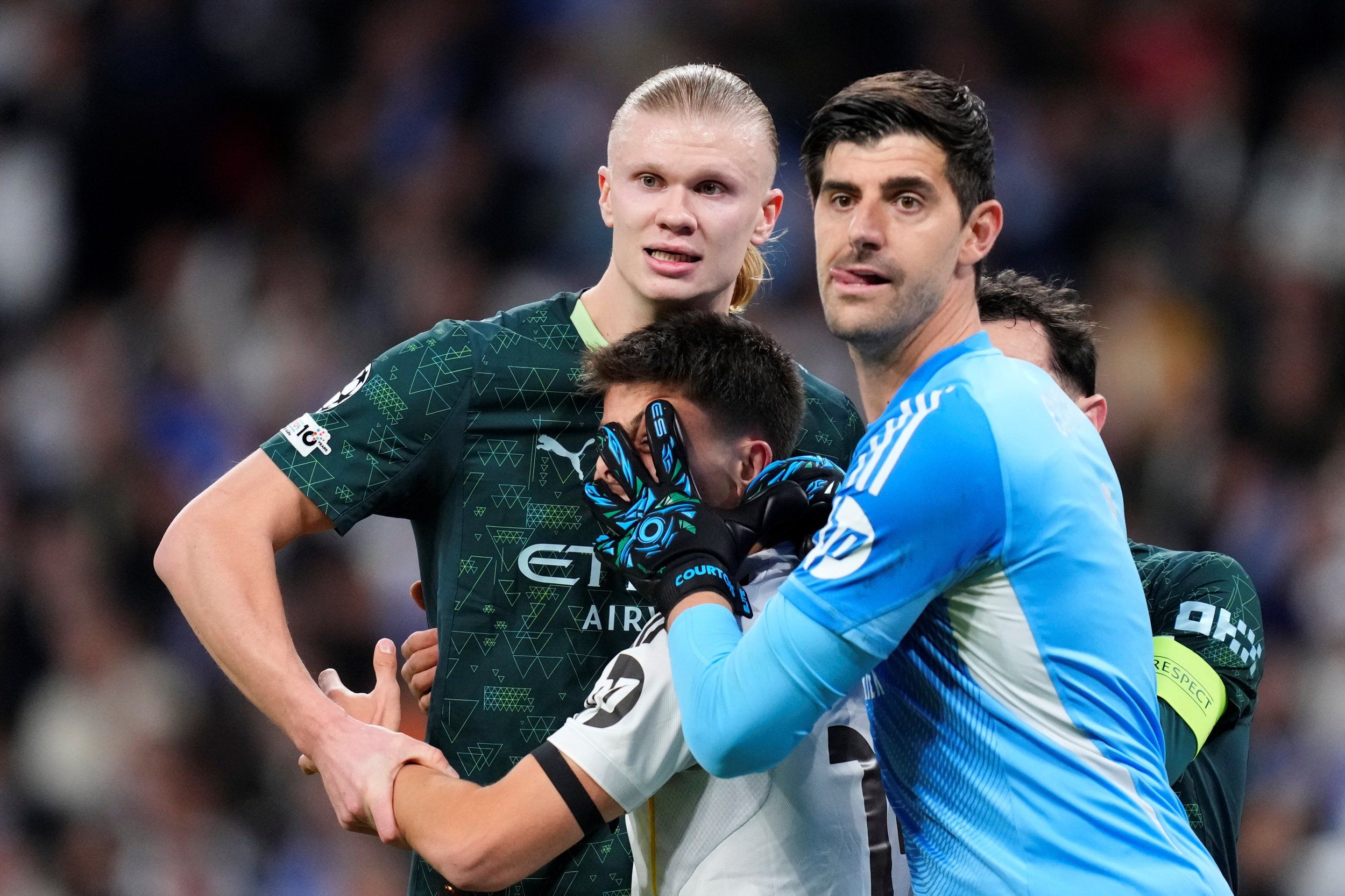 Ерлінг Холанд та Тібо Куртуа / Getty Images