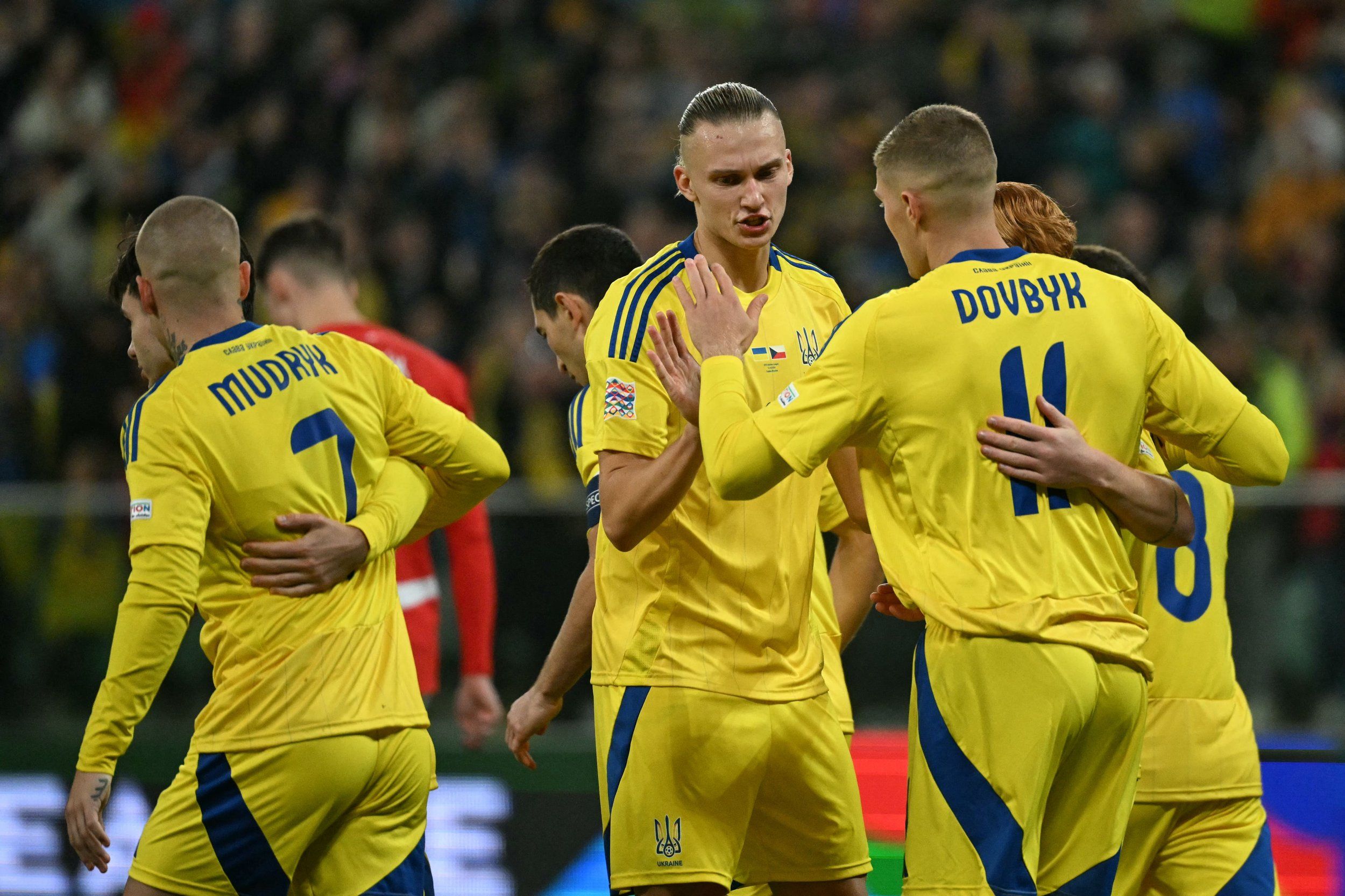 Максим Таловєров (по центру) із партнерами по збірній України / Getty Images
